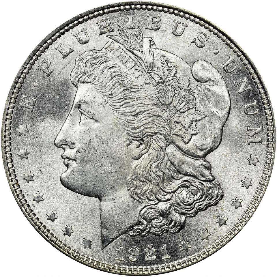 1921 Morgan dollar — obverse: Liberty wearing a cap with plant motifs and a LIBERTY headband.