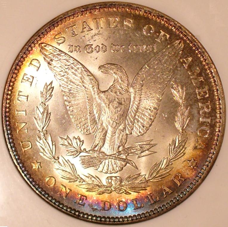 Morgan reverse · 1899 design reference: Use this separate coin to locate the space below the wreath; it is not the reverse of the 1889 specimen.